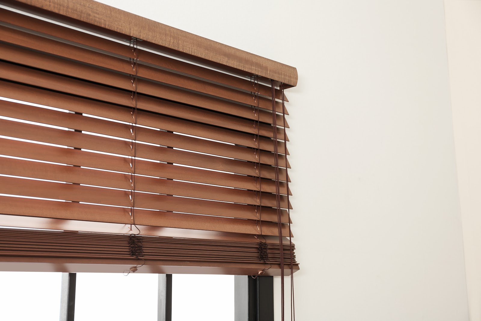 Manual pull-down blinds in small Dubai office space